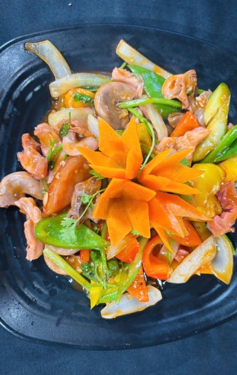 Dồi trường xào cải chua